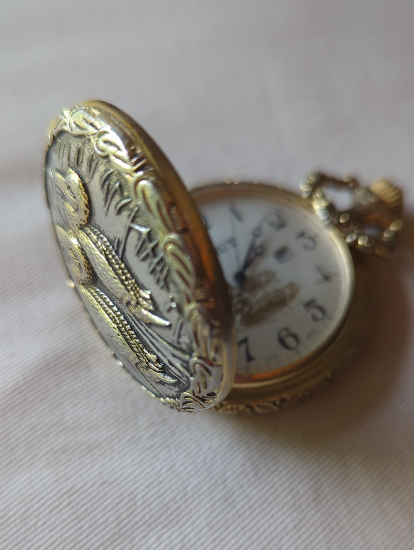 Ornate Gold Pocket Watch With Embossed Case